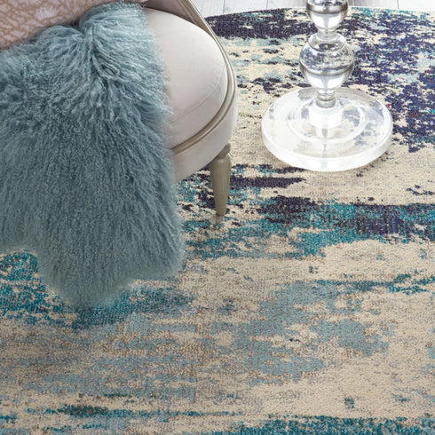 2' X 4' Ivory And Teal Blue Abstract Power Loom Non Skid Area Rug